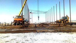 Аренда экскаватора погрузчика с ямобуром в Горно-Алтайск цена от 1532 руб