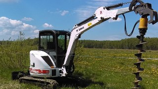 Аренда экскаватора погрузчика с ямобуром в Горно-Алтайск цена от 1532 руб